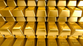 Ціна на золото знижується 8 декбря на зростанні долара